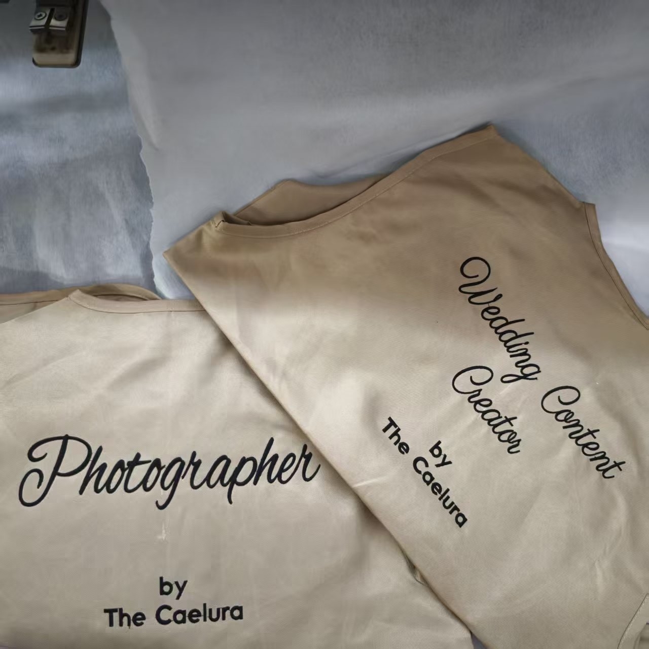 Vest krim bertulis Photographer dan Wedding Content Creator by The Caelura
